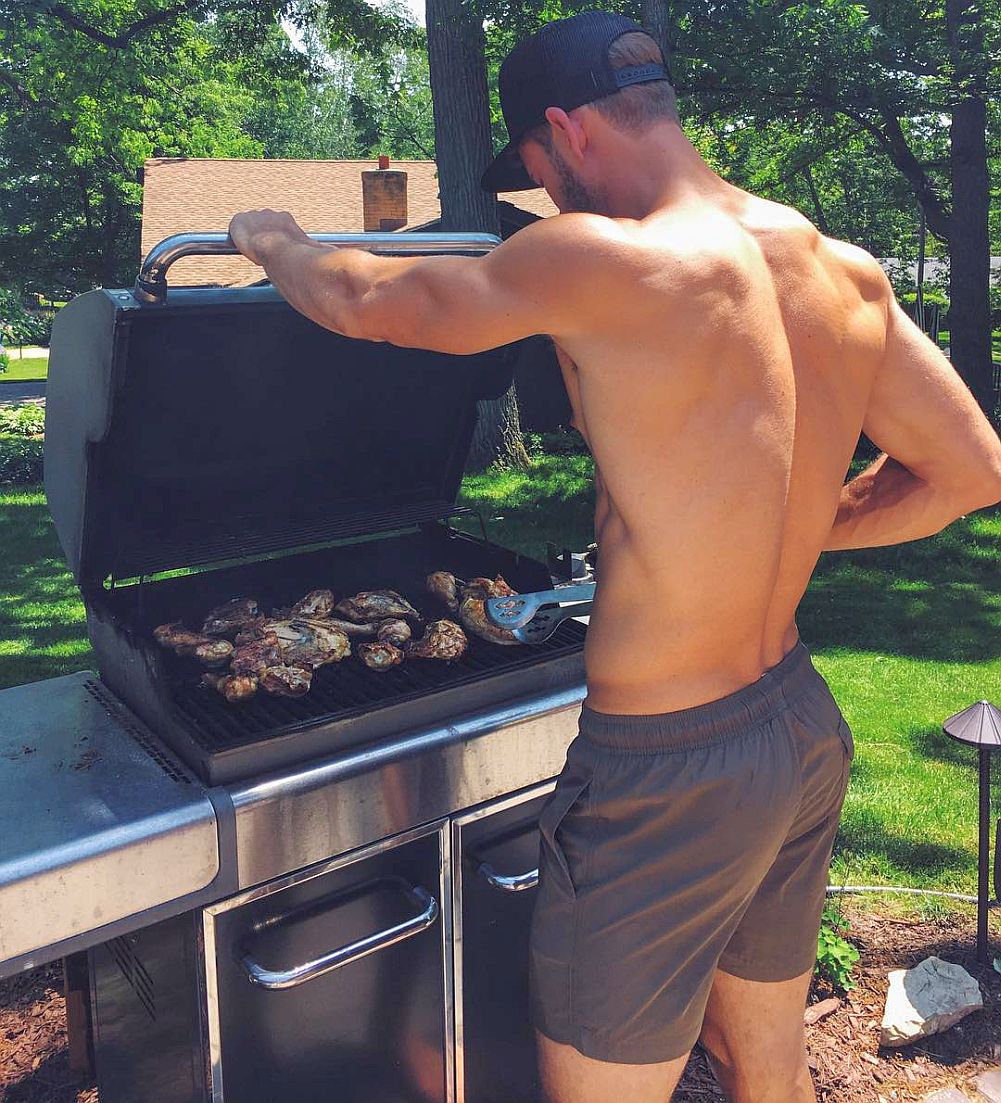 Hot Guy Grilling Boneless Ribeye Steak